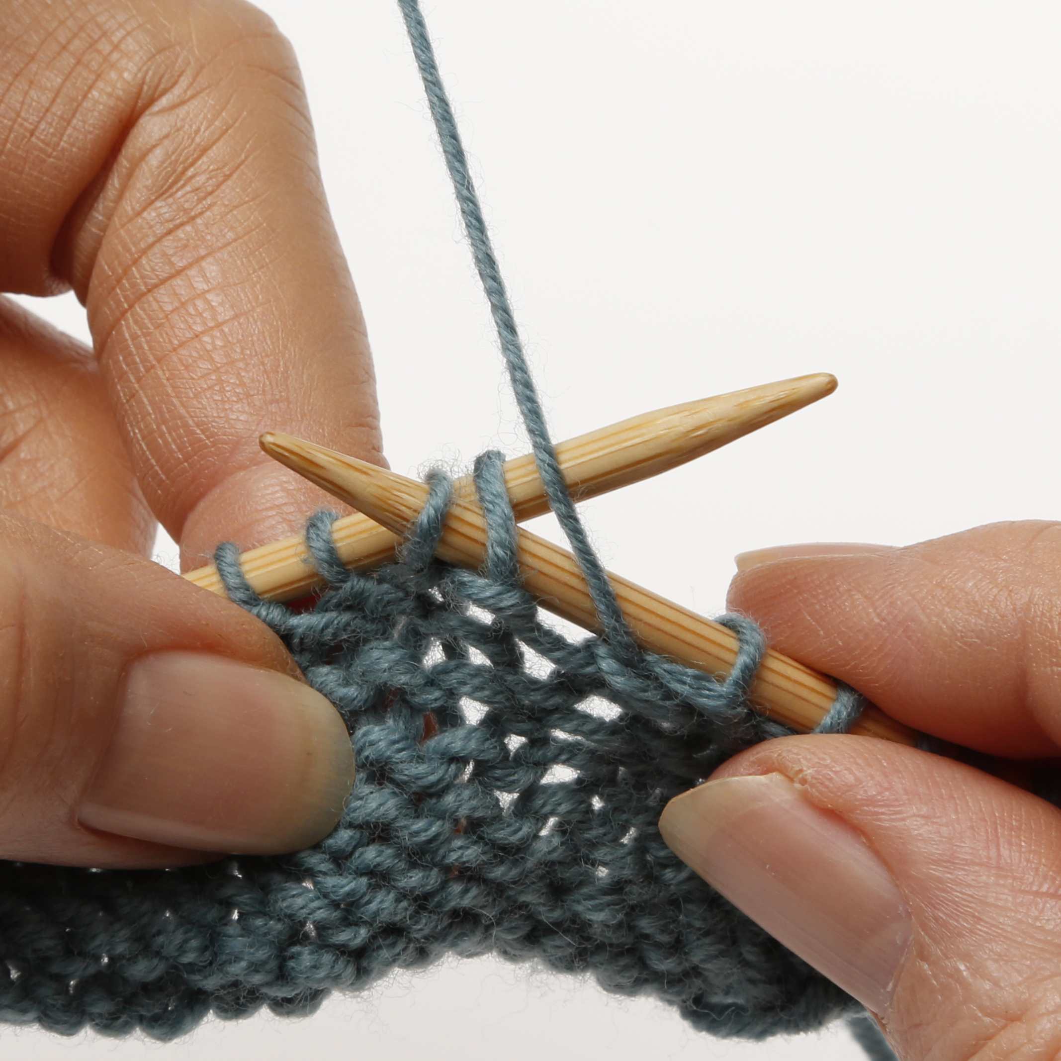 Purl 2 sts together